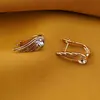 Cercei din cupru placat cu aur galben 18k, model aripa cu zirconiu, imagine 2