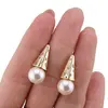 Cercei din cupru placat cu aur galben 18k, model conic cu perla, imagine 3