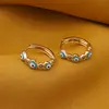 Cercei din cupru placat cu aur galben 18k, model rotund cu ochi protector albastru, imagine 2