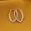 Cercei din cupru placat cu aur roz 18k, model ascutit cu zirconii, imagine 2