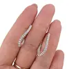Cercei din cupru placat cu aur roz 18k, model ascutit cu zirconii, imagine 3