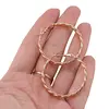 Cercei din cupru placat cu aur roz 18k, model creole rasucite, imagine 3