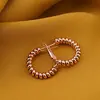 Cercei din cupru placat cu aur roz 18k, model rotund rasucit, imagine 2
