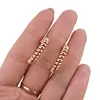 Cercei din cupru placat cu aur roz 18k, model rotund rasucit, imagine 3