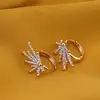 Cercei din cupru placat cu aur roz 18k, model stelat cu zirconii, imagine 2