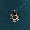 Pandantiv din cupru placat cu aur galben 18k, model rotund dublu si zirconii, imagine 2