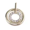 Pandantiv din cupru placat cu aur galben 18k, model rotund dublu si zirconii
