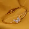 Bratara Cupru placat cu aur galben 18k, cu fluture si zirconii centrale incrustate, imagine 2
