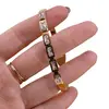 Bratara cupru placat cu aur galben 18k cu zirconii dreptunghiulare baguette, imagine 3
