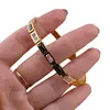 Bratara cupru placat cu aur galben 18k cu zirconii dreptunghiulare baguette albe si negre, imagine 3