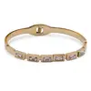 Bratara cupru placat cu aur galben 18k cu zirconii dreptunghiulare baguette