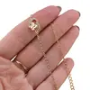 Bratara Cupru placat cu aur galben 18k, zale mici, charm cu inima si fluture, imagine 3