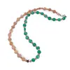 Colier Piatra lunii piersica banuti 7mm, sfere 3mm, Onix verde banuti fatetati 7mm si Hematit auriu steluta