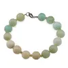 Bratara Crisopraz sfere fatetate 9-10mm si discuri fatetate 4mm