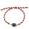 Bratara Martisor cu Lapis lazuli oval cu montura aurie