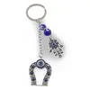 Breloc Feng Shui cu Potcoava, Hamsa si ochi protectori