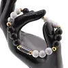 Bratara pentru barbati Obsidian auriu, Howlit sfere 8mm si elemente din inox auriu si argintiu pe elastic, imagine 3