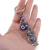 Breloc feng shui cu Bufnita, simbolul Hamsa si ochi protectori - 12cm, imagine 3