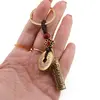Breloc feng shui cu Roata de rugaciuni tibetane pentru protectie si binecuvantare, 10cm, imagine 3