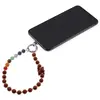 Accesoriu pentru telefon Jasp rosu, cristale 7 chakre si merkaba