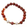 Bratara pe elastic Perle de cultura, bumbi aurii si Agat de foc sfere fatetate 8mm