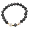Bratara pe elastic Perle de cultura, bumbi aurii si Merlinit sfere 8mm