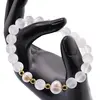 Bratara pe elastic Perle de cultura, bumbi aurii si Selenit sfere 8mm, imagine 3