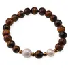 Bratara pe elastic Perle de cultura, bumbi aurii si Ochi de tigru sfere 8mm