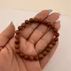 Bratara goldstone cu sfere mate de 8 mm, elastic, lungime 19 cm