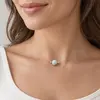 Colier cu sfera de Larimar 9 mm pe fir transparent, inchizatoare din argint, 43 cm – imagine de prezentare în context