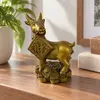 Statueta Feng Shui din rasina aurie, capra cu talismanul Bogatiei, 10 x 7 cm – imagine de prezentare în context