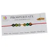 Bratara 7 cristale prosperitate 6mm snur rosu