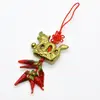 Amuleta canaf Feng Shui Dragon cu ardei rosii