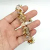 Colier handmade cu citrin, sticla si elemente metalice