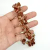 Colier handmade cu goldstone maro, sticla si elemente metalice