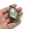 Pandantiv oval scoica abalone cu montura de marcasite