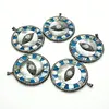 Pandantiv rotund sidef cu marcasite - cu ochi