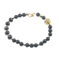 Bratara Turmalina neagra sfere 6mm si Hematit discuri fatetate 8mm cu bumbi aurii