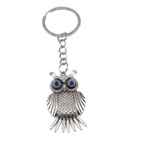 Breloc Bufnita argintie cu Ochiul lui Horus, 10cm