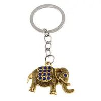 Breloc Elefant auriu cu cristale albastre, 8cm