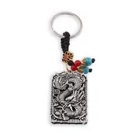 Breloc Feng Shui argintiu cu nod mistic si Dragonul Imperial pentru noroc si putere
