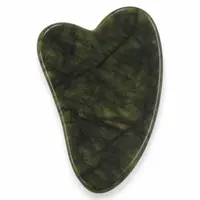 Piatra Gua Sha din Jad pentru masaj - 7cm – produs pe fundal alb