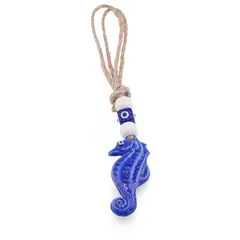 Breloc / Accesoriu din rasina cu ochi protector, calut de mare