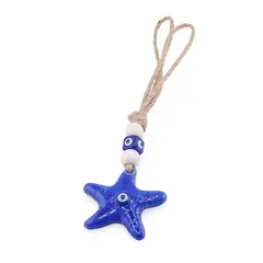 Breloc / Accesoriu din rasina cu ochi protector, stea