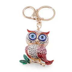 Breloc auriu bufnita emailata cu pene rosii si ochi protectori, 12cm