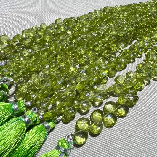 Sirag peridot briolete fatetate 6x5mm, model 3, 20cm