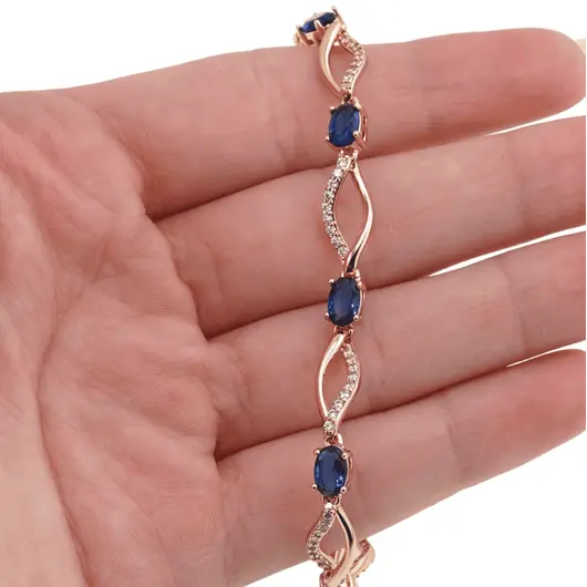 Bratara din cupru placat cu aur roz 18k cu elemente din zirconiu albastru, model curbat, imagine 3