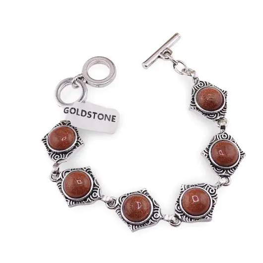 Bratara Goldstone maro cu montura din metal, model cu detalii gravate si colturi accentuate
