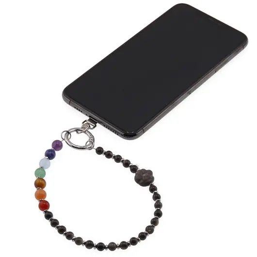 Accesoriu pentru telefon Obsidian auriu, cristale 7 chakre si labuta gravata