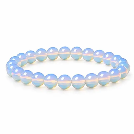 Bratara din opalit cu sfere de 6 mm, pe elastic, lungime 19 cm – produs pe fundal alb